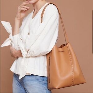 Feed project leather bucket bag